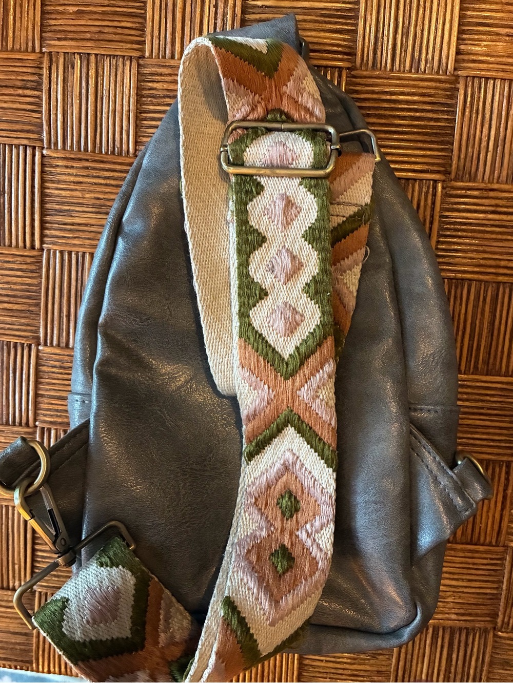 Stylish Slate Leather Sling Bag with Patterned Strap